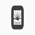 Emaar mobile app icon with logo on smartphone screen.